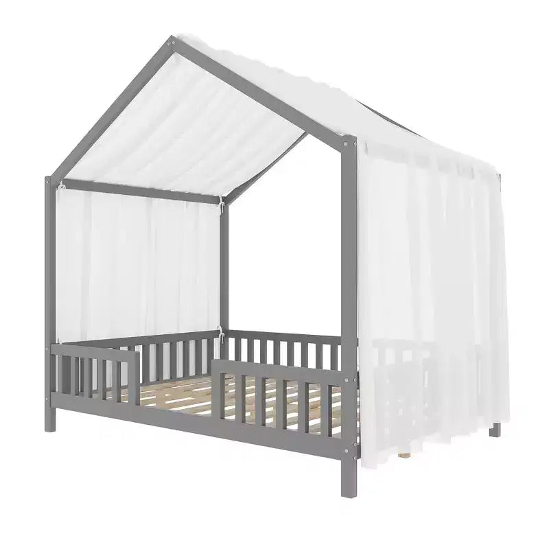 Lit Montessori pleine grandeur en forme de maison basse avec rideaux